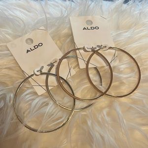 Aldo hoop earrings. Sold as a pair. One silver and the other gold.